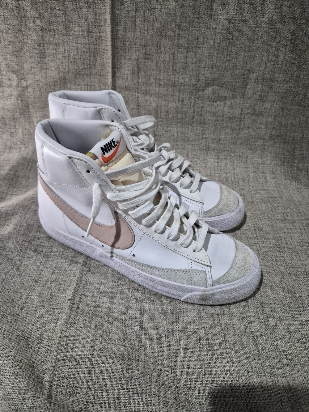 Nike Women's White High-Top Sneakers with Pink Swoosh